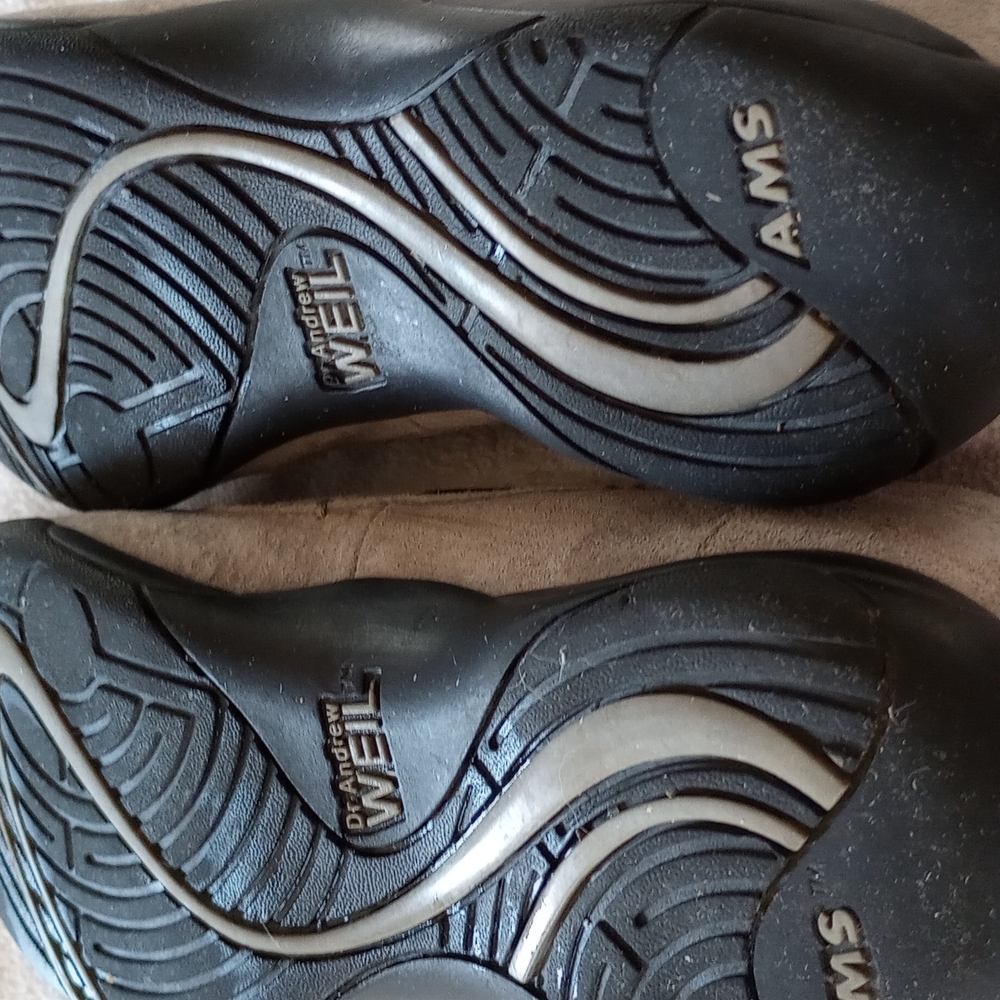KEEN Black Flats with Wave Tread Pattern